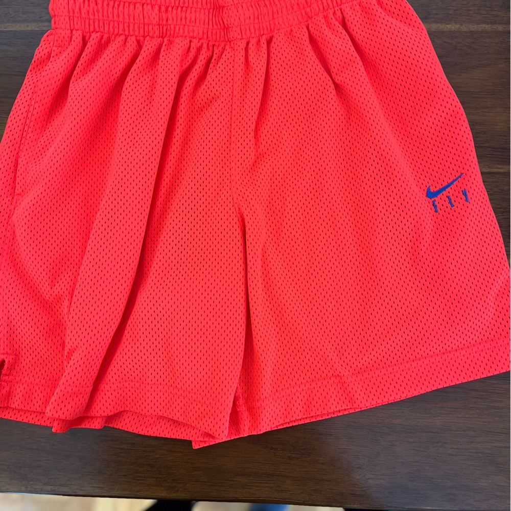 Nike women’s basketball shorts, 5inch inseam, coral color
